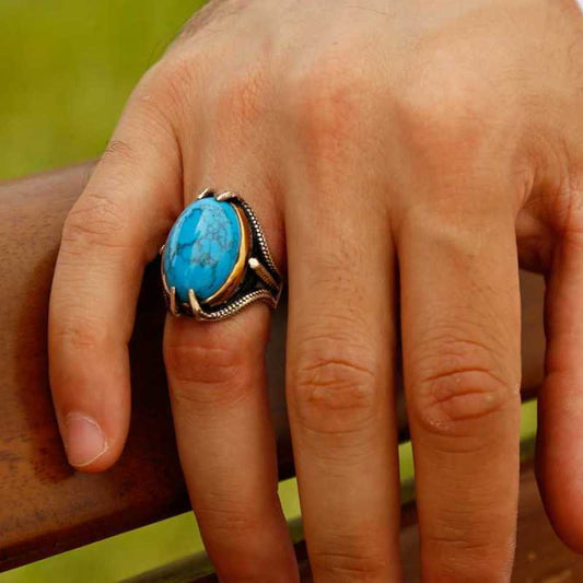 Bague homme en argent avec pierre turquoise et griffe d'aigle