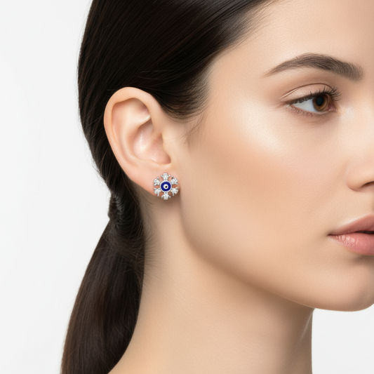 Boucles d'oreilles à tige en argent avec flocon de neige et mauvais œil