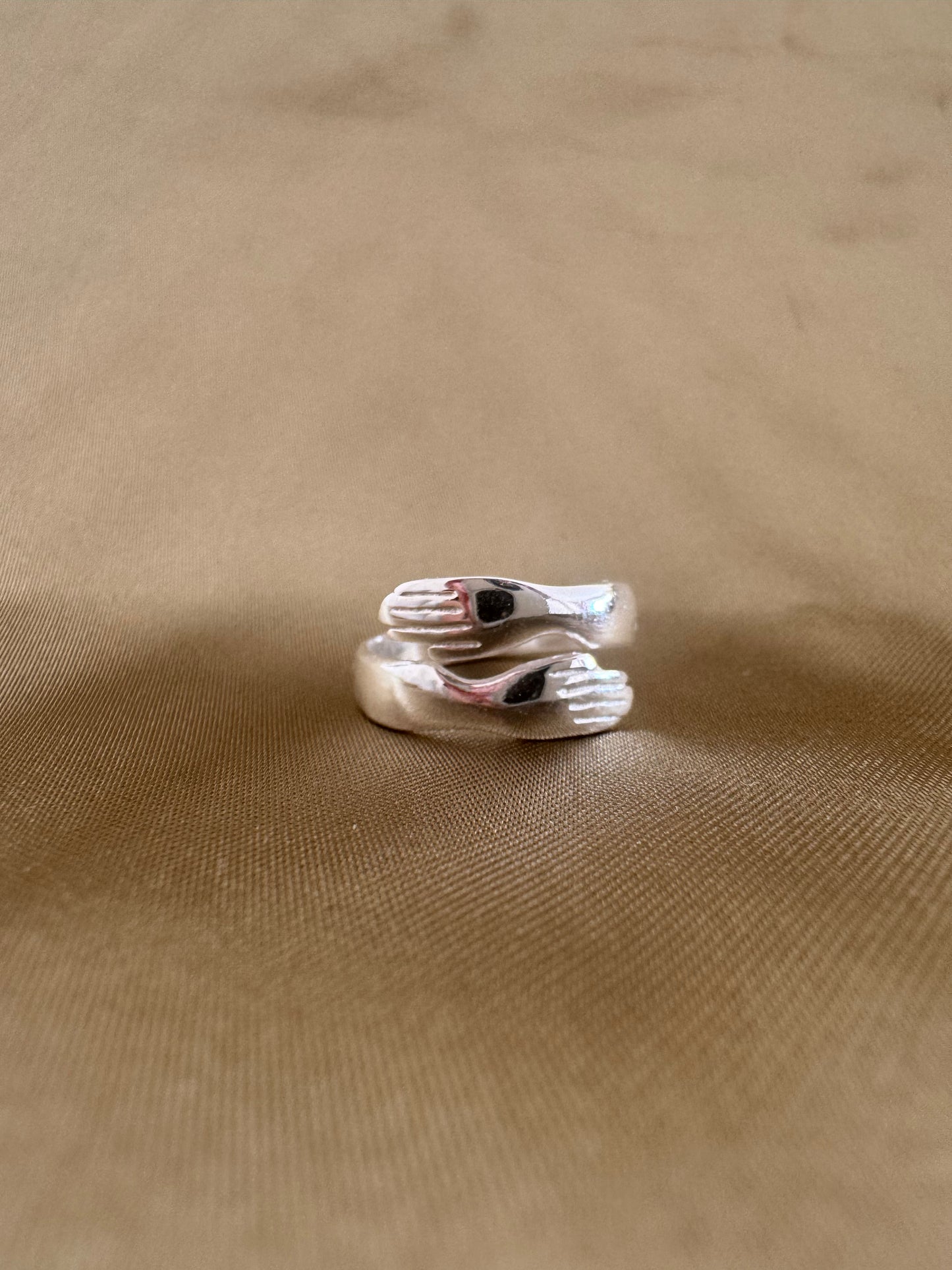 Bague en argent mains jointes