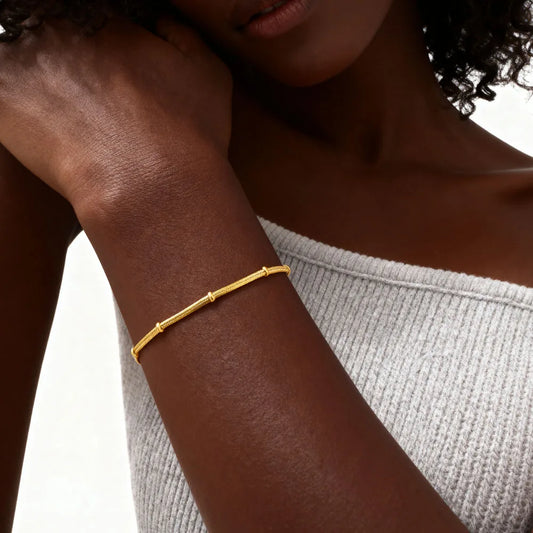 Armband mit Schlangenkugel-Perlenkette im Lagenlook