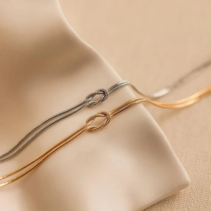 Infinity Love Knot Armband und Halskette