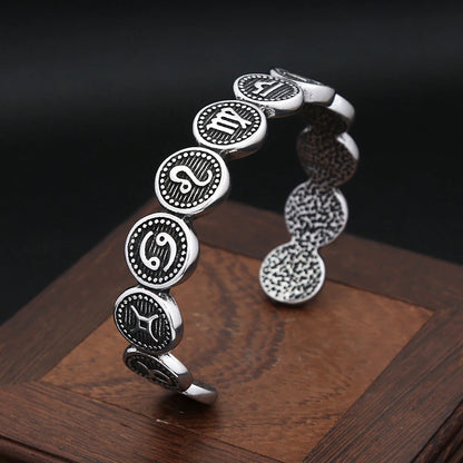 Manschettenarmband mit 12 Sternbildern