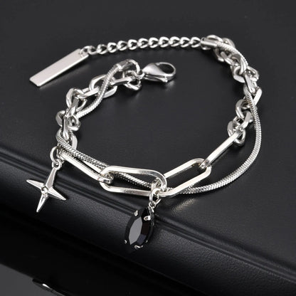 Schlangen- und Büroklammerkettenarmband im Lagenlook