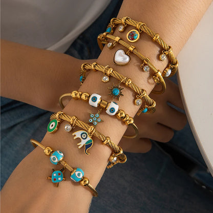 Armband mit Herzanhänger „Böses Auge“
