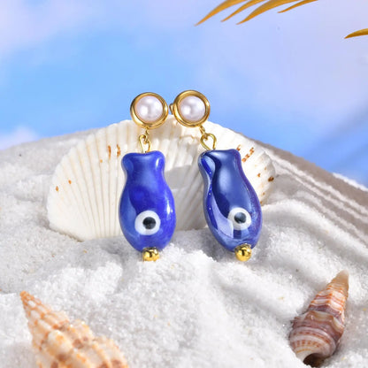 Niedliche Ohrstecker mit Schraubverschluss und Ozean-Charms