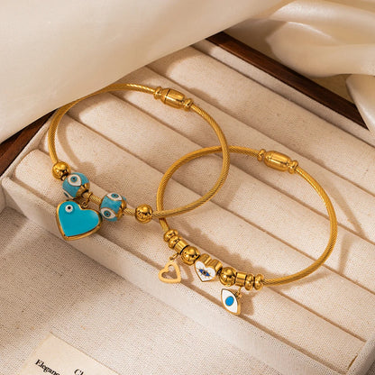 Armband mit Herzanhänger „Böses Auge“