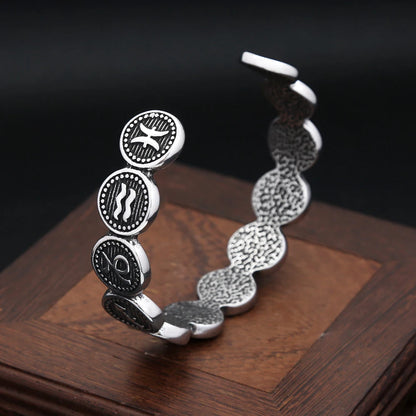 Manschettenarmband mit 12 Sternbildern
