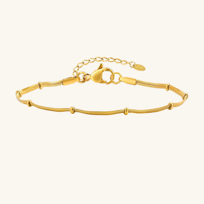 Armband mit Schlangenkugel-Perlenkette im Lagenlook