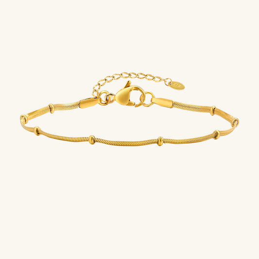 Armband mit Schlangenkugel-Perlenkette im Lagenlook