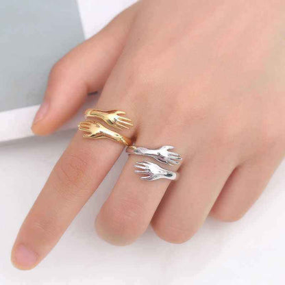 Rose Plated Embracing Hands Silver Ring
