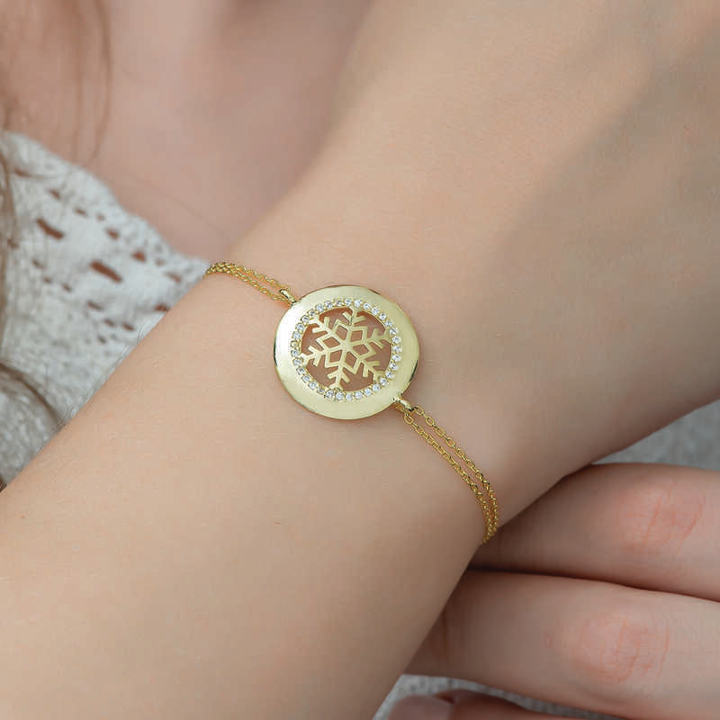 Bracelet en argent plaqué or pour femme avec flocon de neige