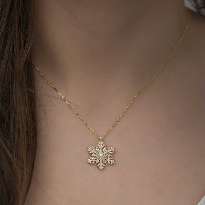 Collier en argent plaqué or avec flocon de neige
