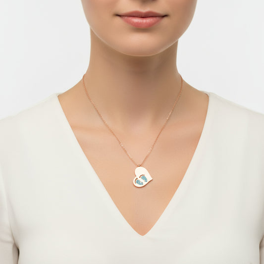 Collier en argent pour femme avec empreinte de pas en forme de cœur