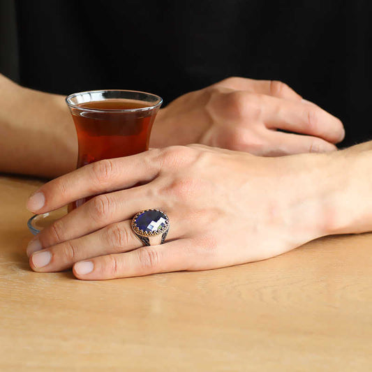 Silberner Herrenring mit blauem Zirkonstein