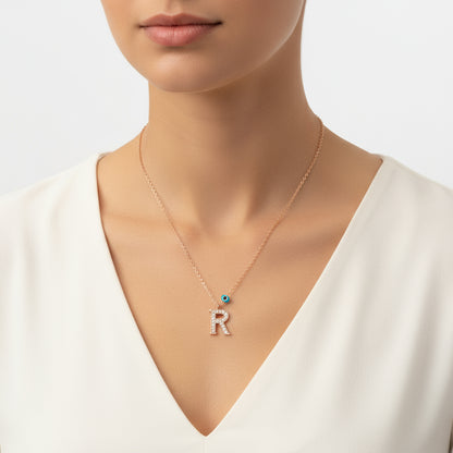 Collier en argent pour femme avec lettre R et rose mauvais œil
