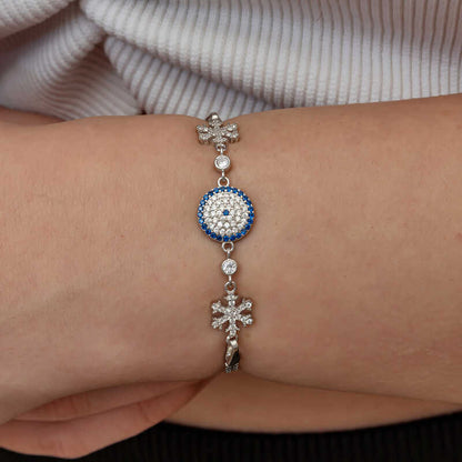 Bracelet en argent pour femme avec flocon de neige et mauvais œil