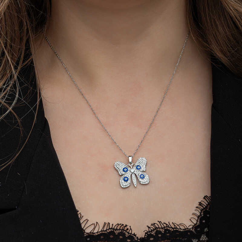 Collier en argent pour femme avec papillon et mauvais œil 