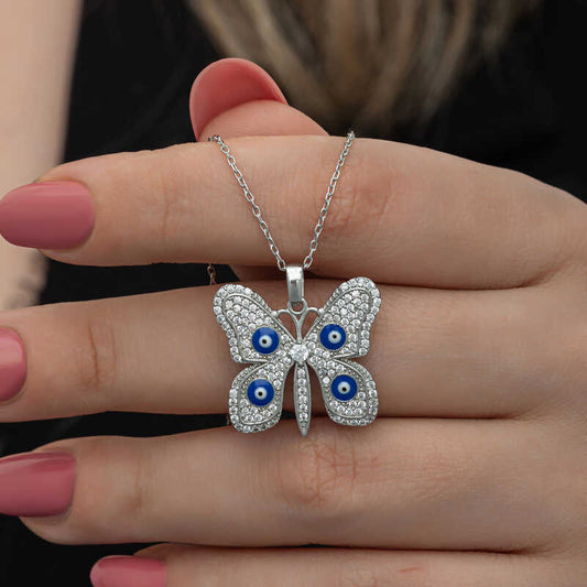 Collier en argent pour femme avec papillon et mauvais œil 