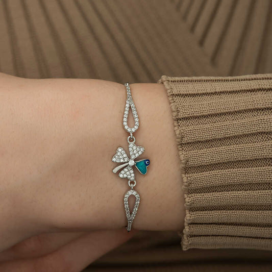 Silbernes Kleeblatt-Armband mit bösem Blick
