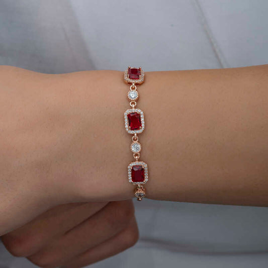 Rosévergoldetes Baguette-Armband mit rotem Stein für Damen