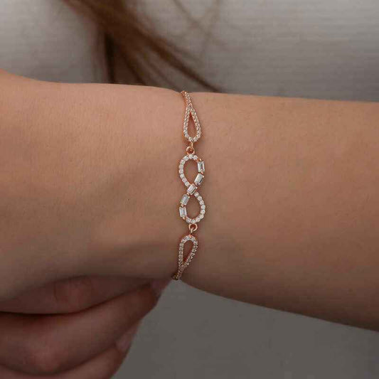 Rose Plated Baguette Stone Infinity Silver Bracelet