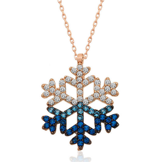 Collier en argent plaqué rose avec flocon de neige en pierre bleue