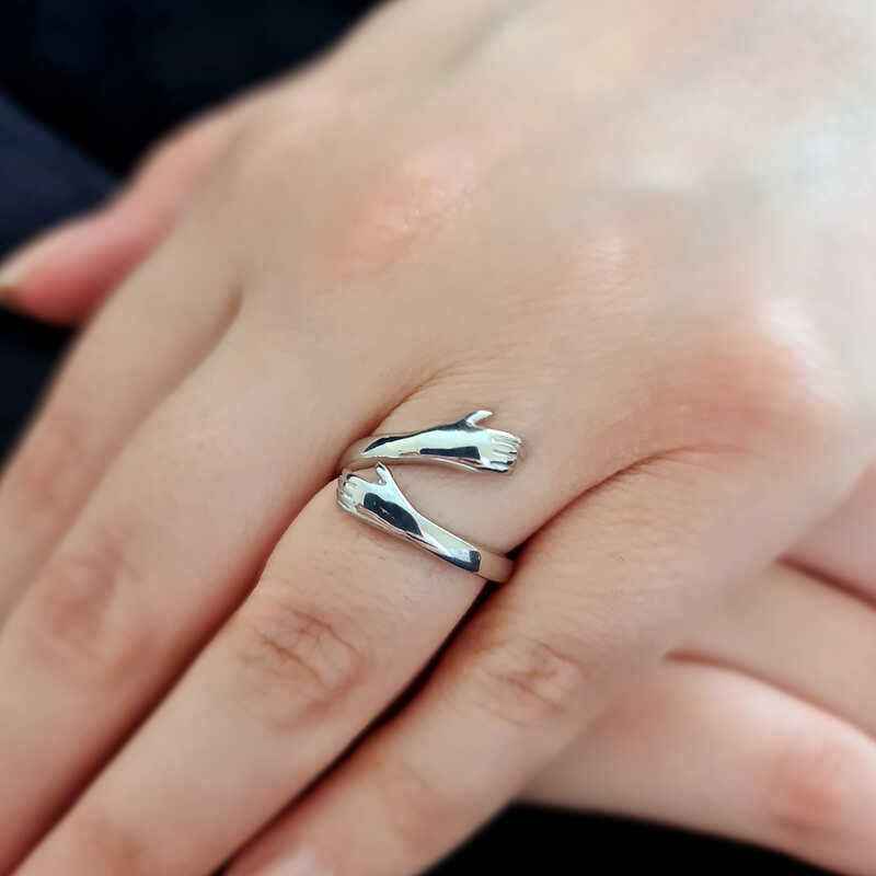 Interlocking Hands Silver Ring