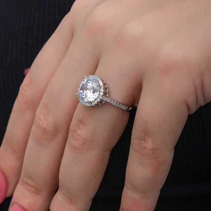 Bague en argent pour femme avec pierre unique à monture ronde