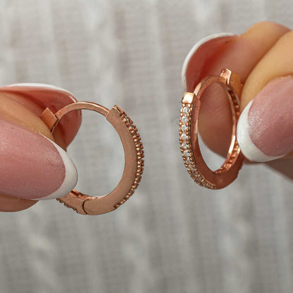 Boucles d'oreilles ovales en argent plaqué or rose avec pierre de zircon